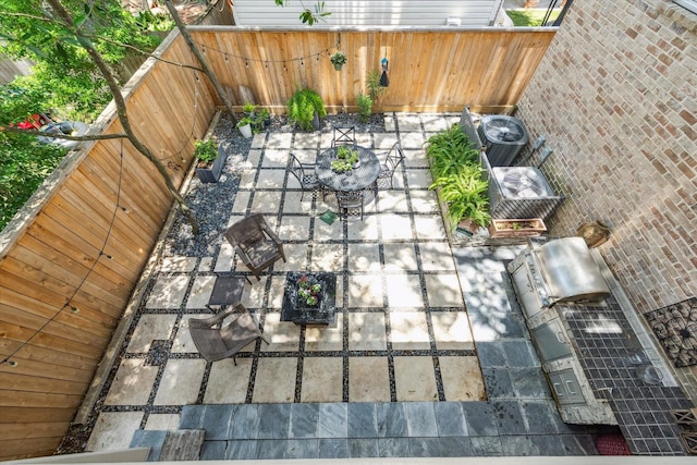 3926 Oberlin St, West University Place, TX 77005 - fenced backyard featuring a patio