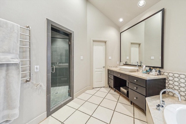 3926 Oberlin St, West University Place, TX 77005 - full bathroom featuring a shower stall, double vanity, vaulted ceiling, tile patterned floors, and recessed lighting