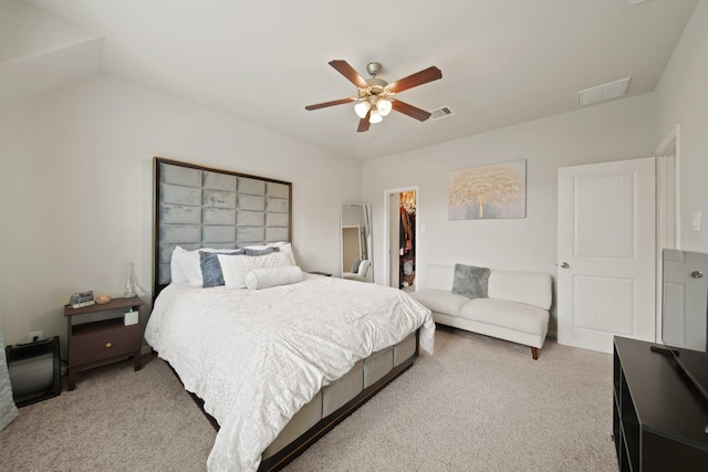 1205 Citruswood Trail Ln, Rosenberg, TX 77471 - bedroom with light colored carpet, a spacious closet, a closet, and ceiling fan