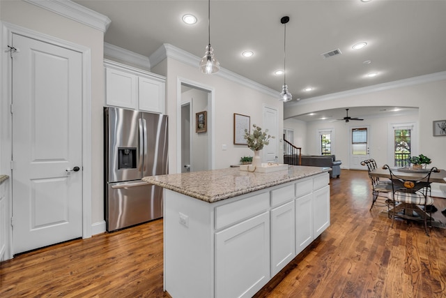 8720 Kempwood Dr, Houston, TX 77080 - kitchen with stainless steel fridge with ice dispenser, ornamental molding, dark wood-style flooring, ceiling fan, and pendant lighting