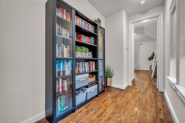 8720 Kempwood Dr, Houston, TX 77080 - corridor with wood finished floors and baseboards