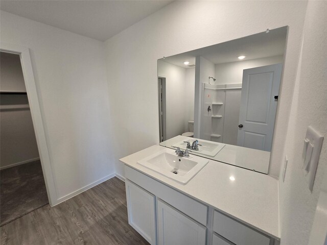 5203 Lake Trout Ln, Baytown, TX 77521 - full bath featuring wood finished floors and vanity
