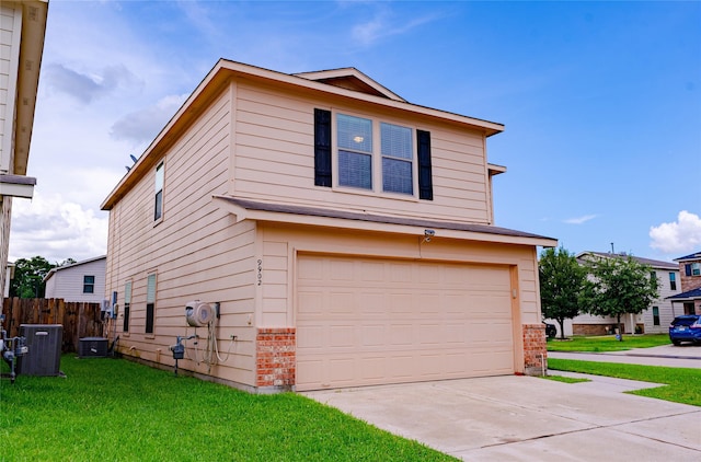 9902 Waldens Pond Ct, Houston, TX 77044 - view of front of home with brick siding, a garage, and concrete driveway