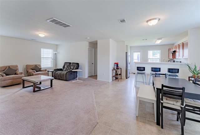 9902 Waldens Pond Ct, Houston, TX 77044 - living room with light tile patterned floors
