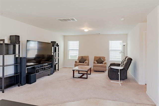 9902 Waldens Pond Ct, Houston, TX 77044 - carpeted living area with baseboards
