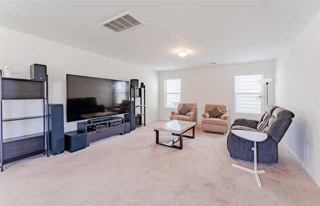 9902 Waldens Pond Ct, Houston, TX 77044 - living area featuring light carpet and baseboards