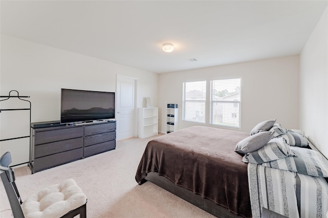 9902 Waldens Pond Ct, Houston, TX 77044 - bedroom with light carpet