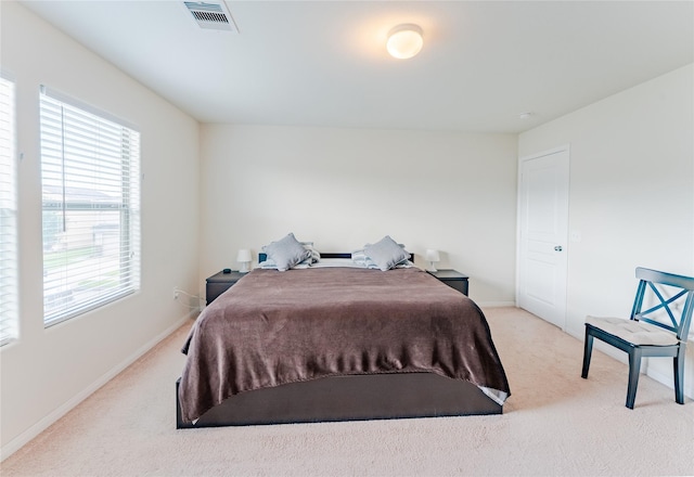 9902 Waldens Pond Ct, Houston, TX 77044 - carpeted bedroom featuring baseboards