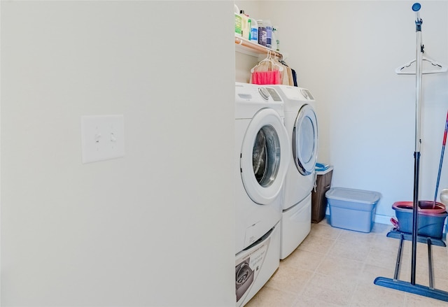 9902 Waldens Pond Ct, Houston, TX 77044 - washroom with washing machine and dryer
