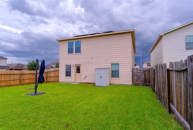 9902 Waldens Pond Ct, Houston, TX 77044 - back of house featuring a fenced backyard
