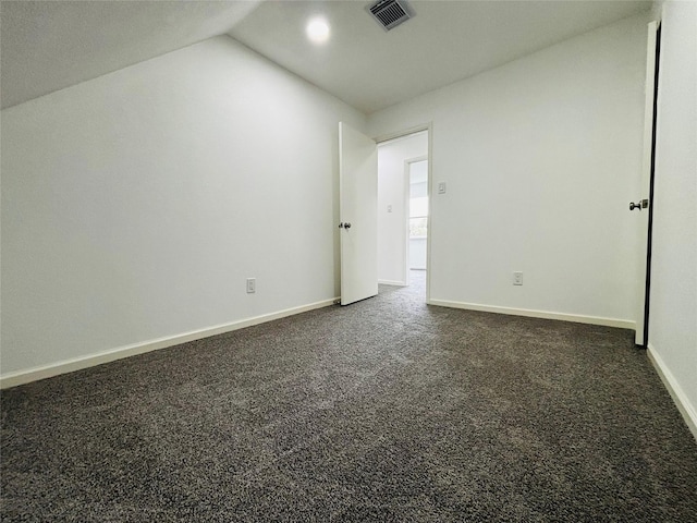 16246 Los Altos Dr, Houston, TX 77083 - spare room featuring dark colored carpet and vaulted ceiling