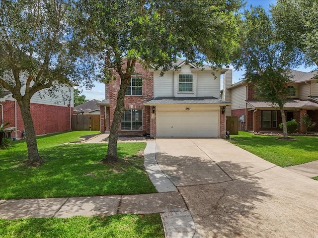 1054 Inverness Cv, Dickinson, TX 77539 - traditional home with brick siding, an attached garage, and driveway