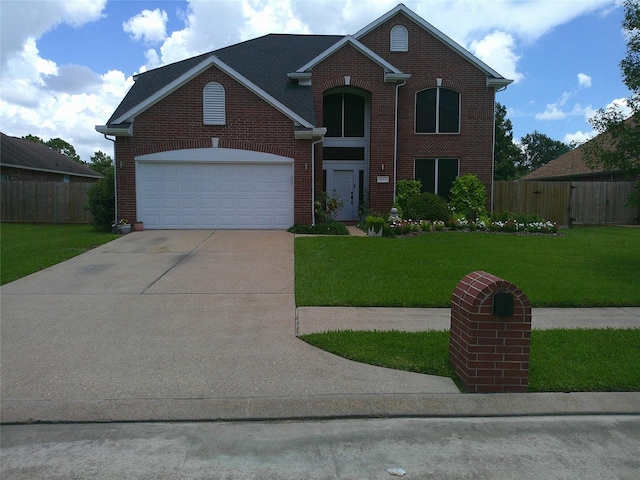 3307 Norma Ln, Pearland, TX 77584 - traditional-style home with brick siding, concrete driveway, and a garage