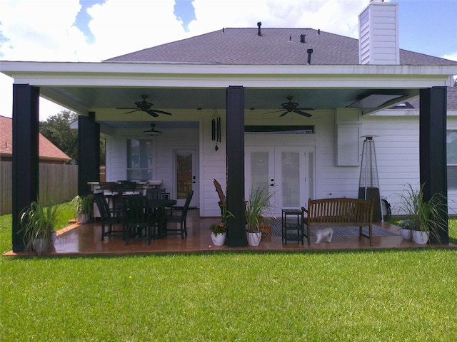 3307 Norma Ln, Pearland, TX 77584 - back of property featuring ceiling fan, french doors, a chimney, and a patio area