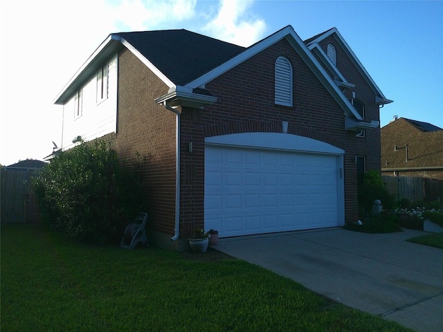3307 Norma Ln, Pearland, TX 77584 - view of property exterior with brick siding, a garage, and concrete driveway