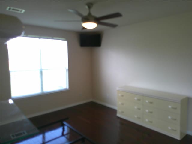 3307 Norma Ln, Pearland, TX 77584 - interior space featuring dark wood-style flooring, healthy amount of natural light, and mail area