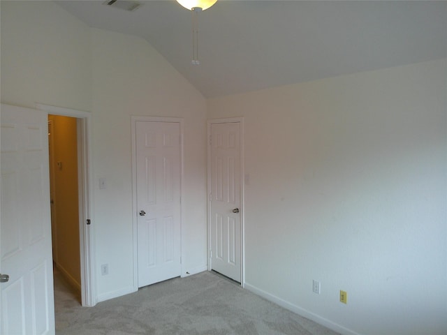 3307 Norma Ln, Pearland, TX 77584 - unfurnished bedroom featuring light carpet and vaulted ceiling