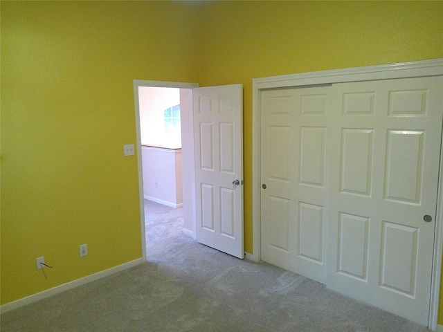3307 Norma Ln, Pearland, TX 77584 - unfurnished bedroom featuring carpet flooring and a closet