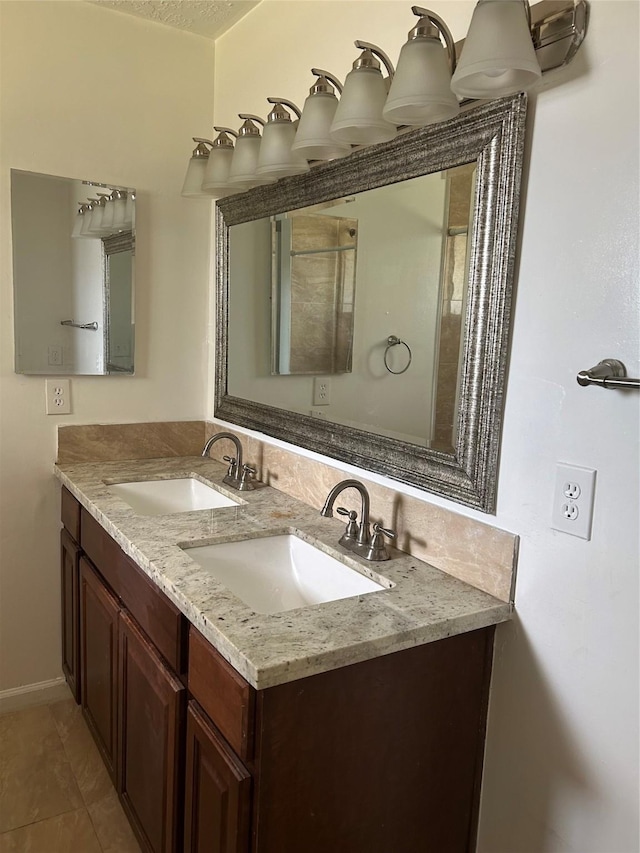 727 Doncrest St, Channelview, TX 77530 - bathroom with double vanity and tile patterned floors
