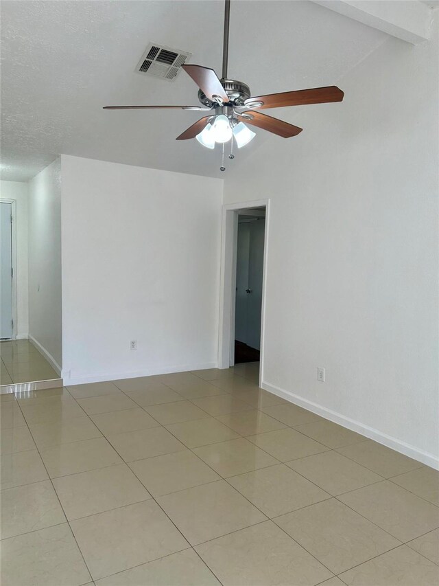 727 Doncrest St, Channelview, TX 77530 - empty room with a ceiling fan and light tile patterned floors