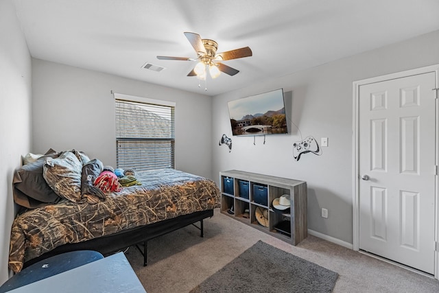 8315 Egret Bay Cir, Baytown, TX 77523 - bedroom with carpet flooring and ceiling fan