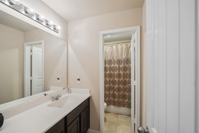 1306 S Maple Dr, Katy, TX 77493 - bathroom featuring vanity and tile patterned floors