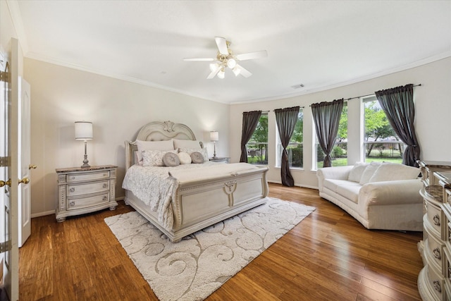 17326 Mesquite Brush Ln, Houston, TX 77095 - bedroom featuring crown molding, wood finished floors, and ceiling fan