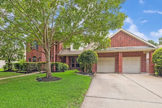 17326 Mesquite Brush Ln, Houston, TX 77095 - view of front of house with driveway, brick siding, a front lawn, and an attached garage