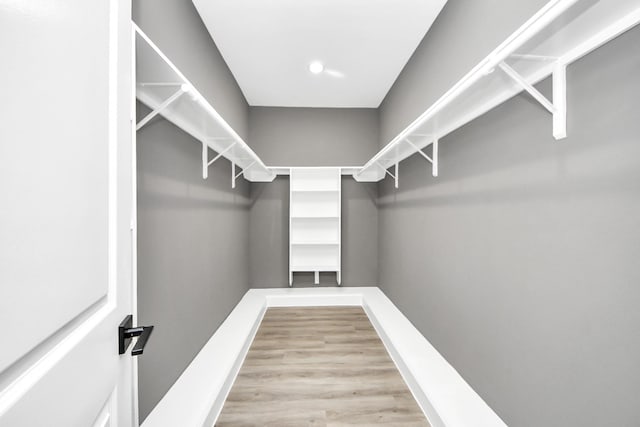 601 Lily St, Waller, TX 77484 - walk in closet featuring wood finished floors