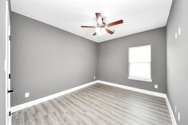 601 Lily St, Waller, TX 77484 - spare room with a ceiling fan and wood finished floors