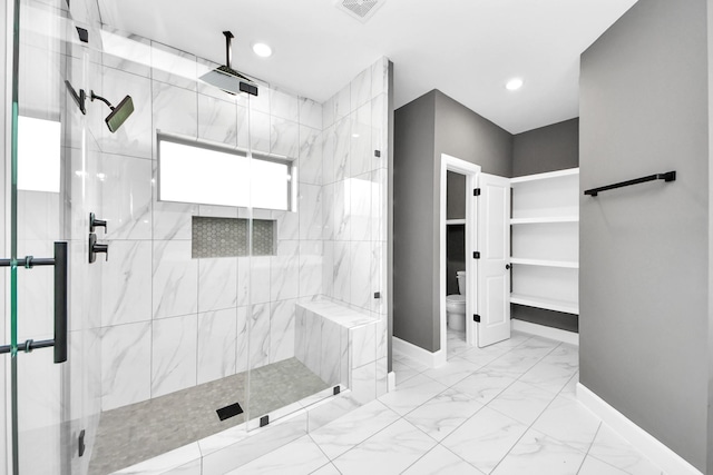 601 Lily St, Waller, TX 77484 - full bathroom featuring marble finish floors, a marble finish shower, and recessed lighting