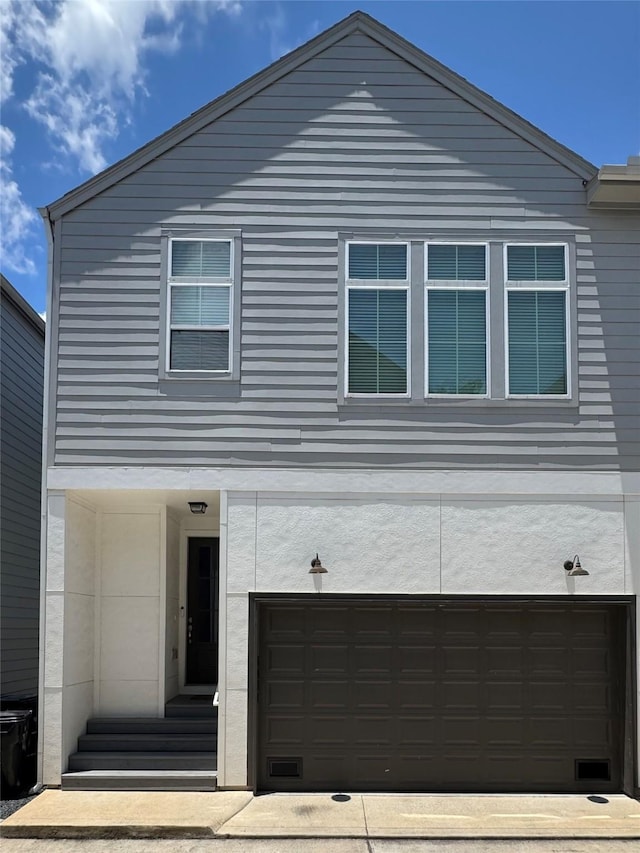 6031 Cypress St, Houston, TX 77074 - view of front of home featuring an attached garage