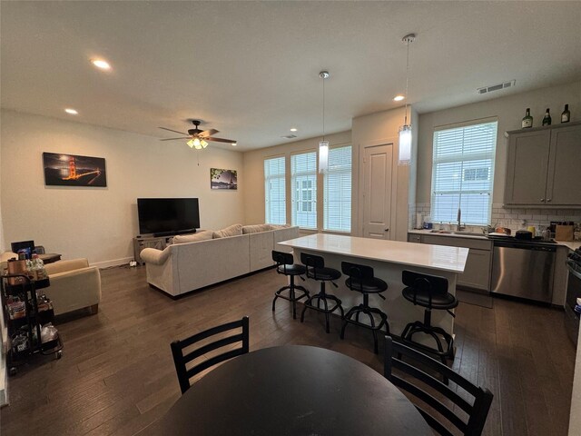 6031 Cypress St, Houston, TX 77074 - dining area featuring plenty of natural light, dark wood-style flooring, recessed lighting, and ceiling fan