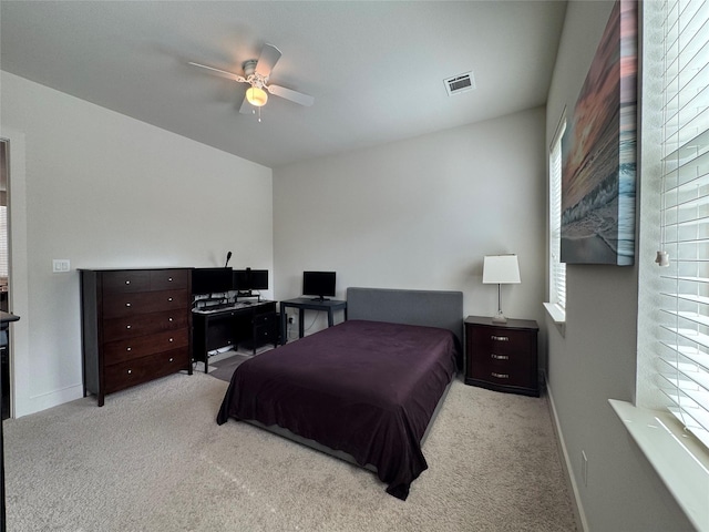 6031 Cypress St, Houston, TX 77074 - carpeted bedroom featuring baseboards and ceiling fan