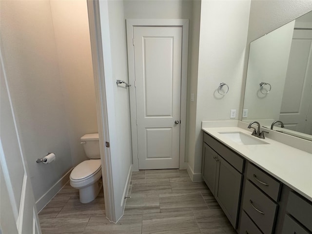 6031 Cypress St, Houston, TX 77074 - bathroom featuring toilet and vanity