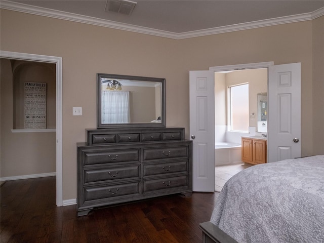 19327 Dickson Park Dr, Spring, TX 77373 - bedroom featuring ornamental molding, dark wood-style floors, and ensuite bath