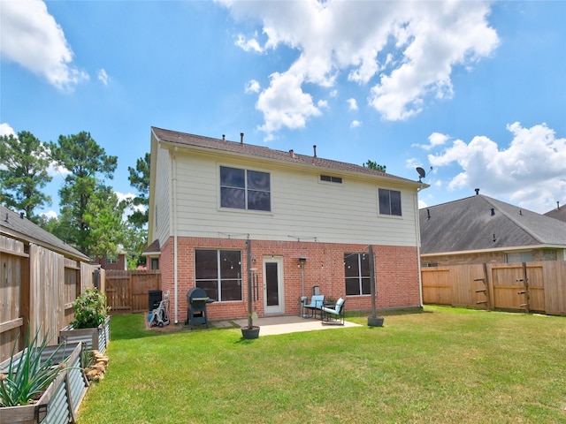 19327 Dickson Park Dr, Spring, TX 77373 - rear view of house with brick siding, a patio, and a fenced backyard