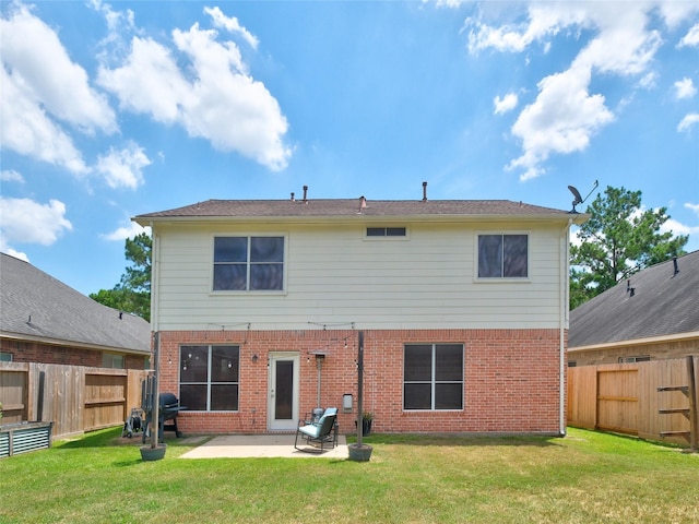 19327 Dickson Park Dr, Spring, TX 77373 - back of house featuring a patio area, brick siding, and a fenced backyard