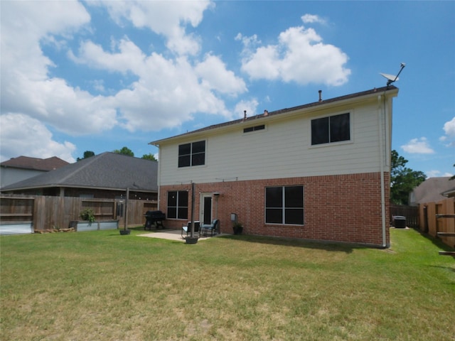 19327 Dickson Park Dr, Spring, TX 77373 - rear view of property featuring brick siding, a patio area, and a fenced backyard