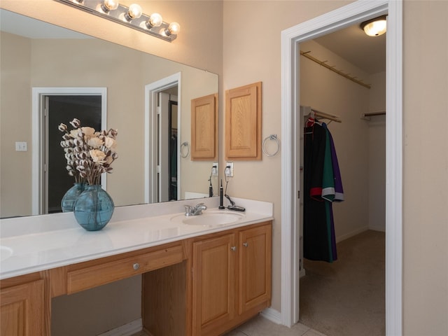 19327 Dickson Park Dr, Spring, TX 77373 - bathroom with double vanity and a walk in closet