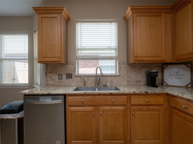19327 Dickson Park Dr, Spring, TX 77373 - kitchen with dishwasher, tasteful backsplash, and light stone counters