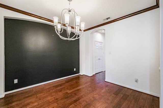 13811 Pepperstone Ln, Houston, TX 77044 - unfurnished room featuring arched walkways, a chandelier, wood finished floors, and crown molding