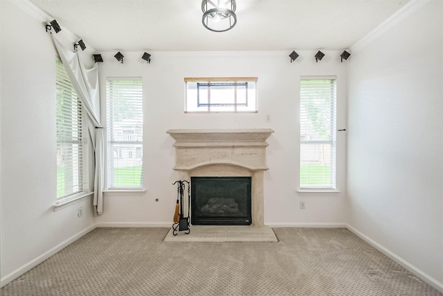 13811 Pepperstone Ln, Houston, TX 77044 - unfurnished living room featuring a glass covered fireplace, crown molding, and carpet flooring