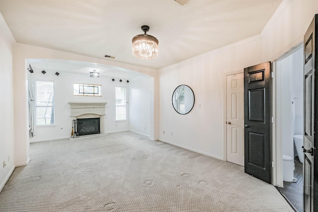 13811 Pepperstone Ln, Houston, TX 77044 - unfurnished living room with a chandelier, light carpet, and a fireplace with raised hearth