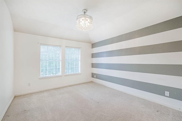 13811 Pepperstone Ln, Houston, TX 77044 - carpeted empty room with a chandelier and baseboards