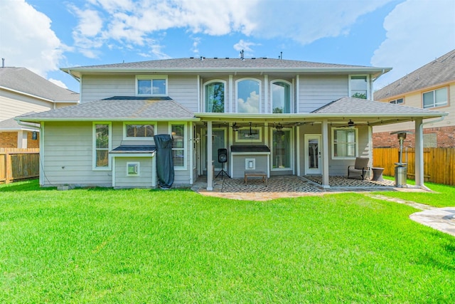 13811 Pepperstone Ln, Houston, TX 77044 - rear view of property featuring a fenced backyard, a ceiling fan, and a patio