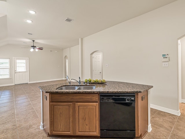 10163 Rose Willow Ln, Brookshire, TX 77423 - kitchen with black dishwasher, arched walkways, light tile patterned flooring, ceiling fan, and lofted ceiling