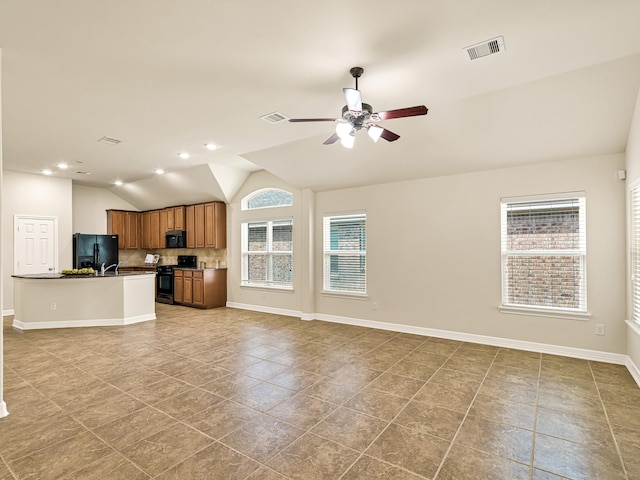 10163 Rose Willow Ln, Brookshire, TX 77423 - unfurnished living room featuring lofted ceiling, light tile patterned flooring, ceiling fan, and recessed lighting