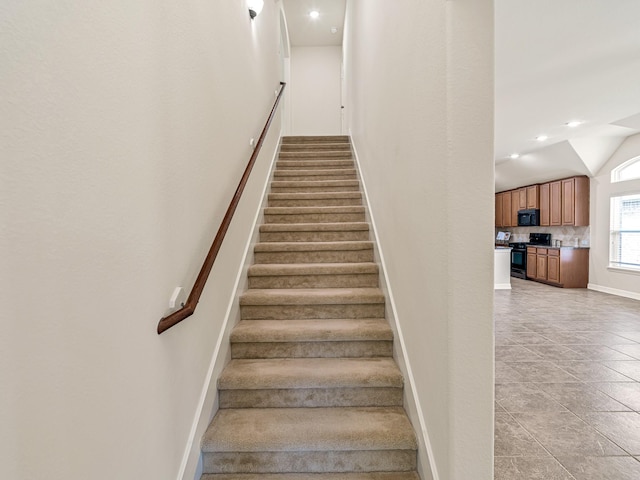 10163 Rose Willow Ln, Brookshire, TX 77423 - stairway with recessed lighting and vaulted ceiling