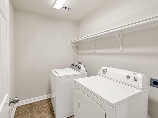 10163 Rose Willow Ln, Brookshire, TX 77423 - laundry area featuring washer and clothes dryer and tile patterned flooring